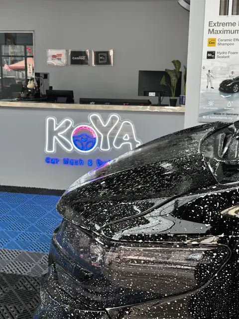 Snow foam wash in front of the KOYA counter