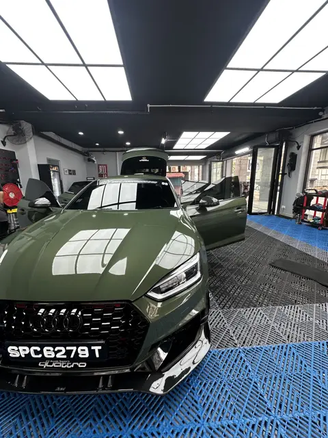 Green Audi RS5 in the KOYA bay
