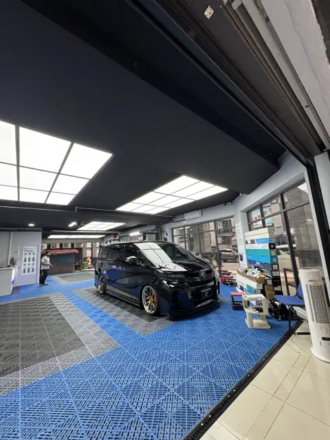 KOYA detailing bay with blue tiled floor