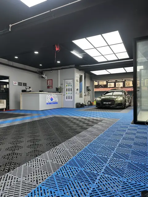 KOYA detailing bay with blue tiled floor