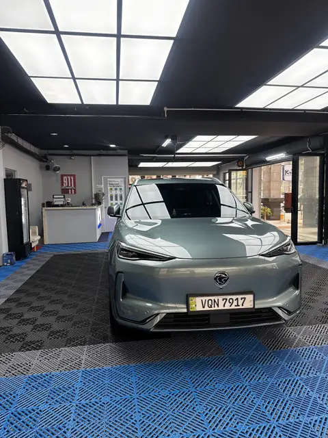 Sage green EV in the KOYA bay
