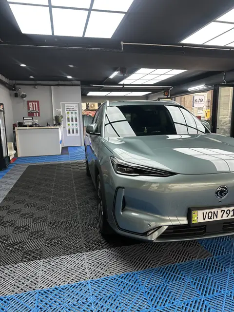 Sage green EV in the KOYA bay