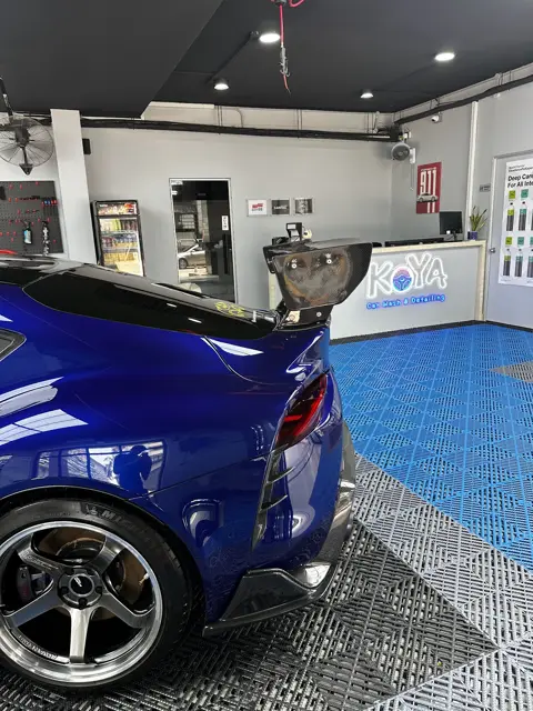Blue Toyota Supra with carbon bonnet at KOYA