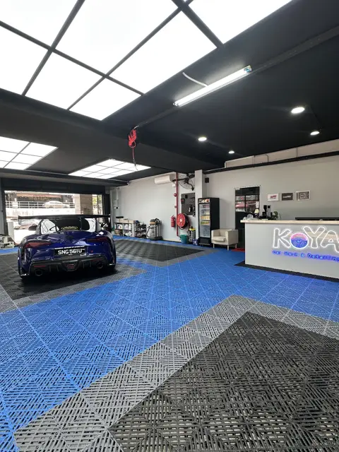 Blue Toyota Supra with carbon bonnet at KOYA