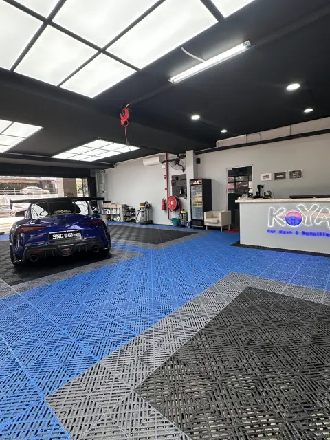 Blue Toyota Supra with carbon bonnet at KOYA